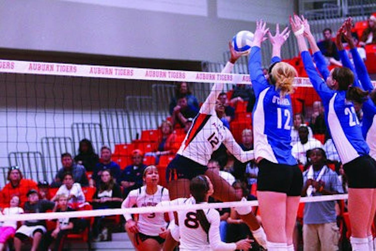 Sophomore Courtney McDonald attempts a spike Sunday at home against Kentucky. (Rebecca Croomes / ASSISTANT PHOTO EDITOR)