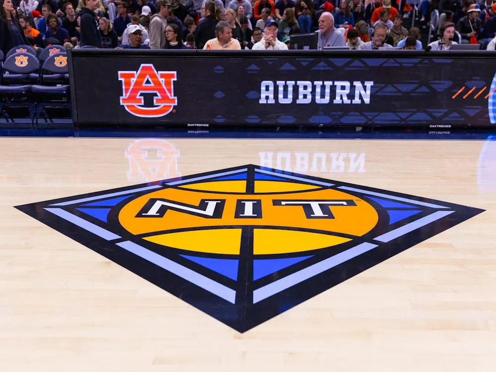 The NIT logo on the court at Neville Arena on March 17, 2026.