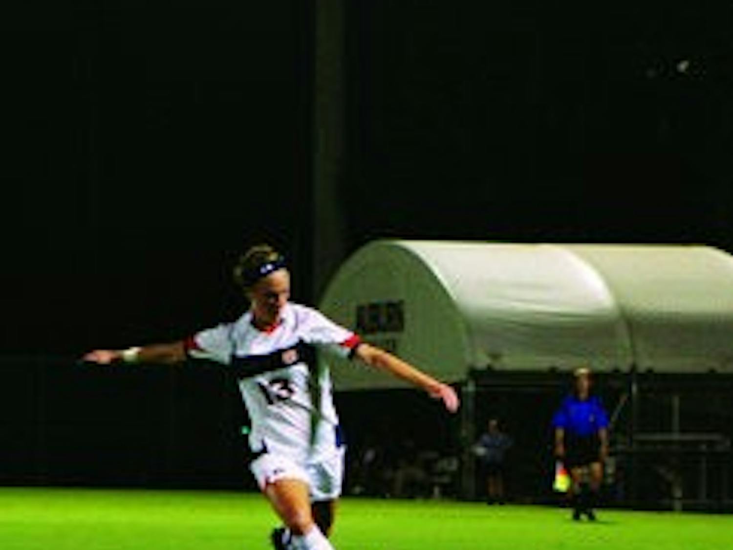 Junior forward Mary Coffed makes a pass against Kennesaw State last season. (Rebecca Croomes / ASSISTANT PHOTO EDITOR)