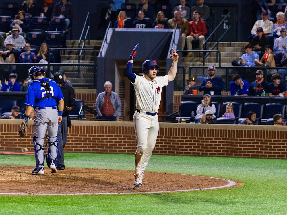 Bristol Carter gets the crowd fired up after scoring Auburn's first run against UWG on Feb. 25, 2026. 