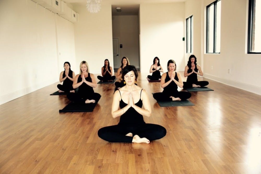 Contributed by The Yoga Room
Yoga students practicing a sitting meditation.