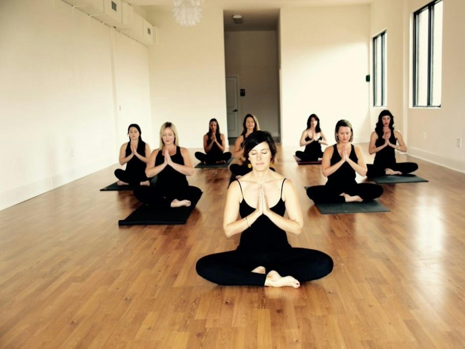 Contributed by The Yoga Room
Yoga students practicing a sitting meditation.