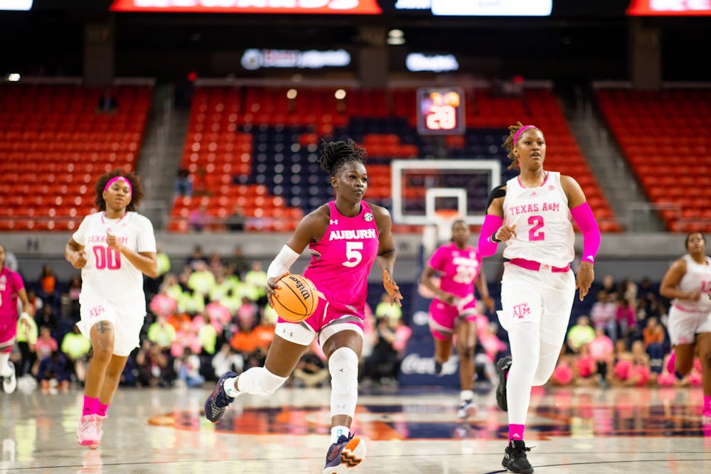 Auburn guard Aicha Coulibaly takes the ball down the court against Texas A&M on February 16, 2023 in Neville Arena. 