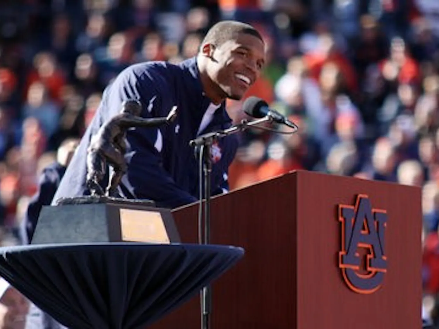Cam Newton speaks after being presented the Heisman Trophy at the celebration. (Emily Adams/PHOTO EDITOR)