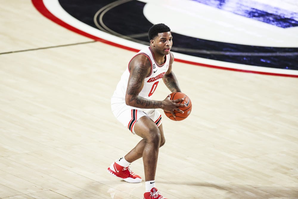 Georgia basketball player K.D. Johnson (0) during a game against Auburn at Stegeman Coliseum in Athens, Ga., on Wednesday, January 13, 2020. (Photo by Tony Walsh)