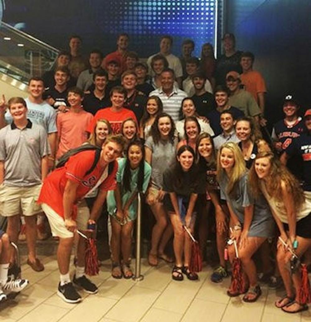 Auburn students and fans greet men's basketball head coach Bruce Pearl after the end of his show-cause penalty Aug. 24. (David McKinney | Sports Reporter)