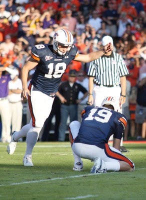 Senior place kicker Wes Byrum attempts an extra point against LSU. (Emily Adams / Photo Editor)