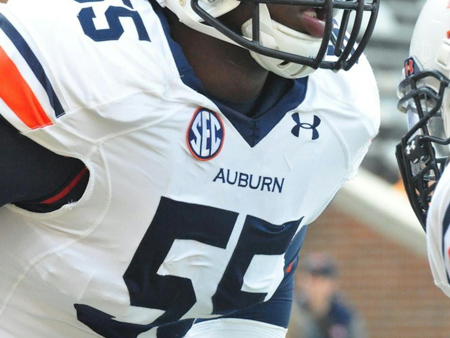 Carl Lawson playing against Tennessee on Saturday. (FILE PHOTO)