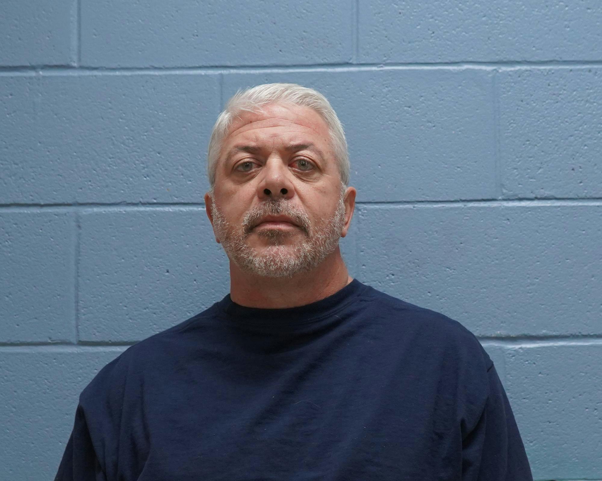 Brian Scott Barrett, 53, was arrested and charged in connection to spousal abuse on Feb. 24.