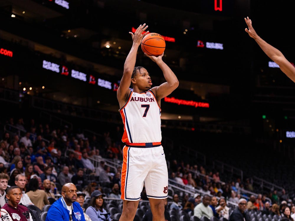 Keyshawn Hall shoots a three from the corner during Auburn's exhibition game against Memphis on Oct. 30, 2025.