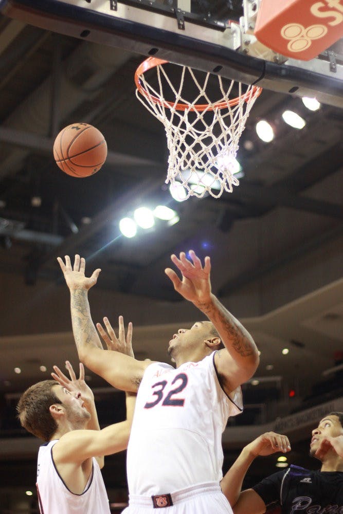 Chris Griffin and Ben Griciunas attempt to rebound the ball during the game against Paine College on November 1, 2013. (Jenna Burgess / ASSOCIATE PHOTO EDITOR)