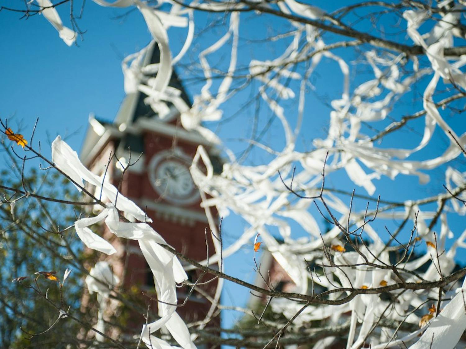Toilet paper hangs from a tree in front of Samford Hall on Monday, Nov. 27 in Auburn, Ala.