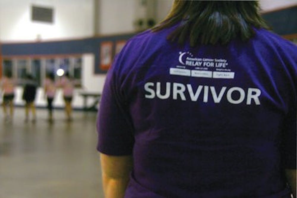 Collier's bright purple survivor shirt shows her victory over Hodgkin's lymphoma, a cancer that causes lymphatic cells to enlarge. (Rebekah weaver / Assistant photo editor)