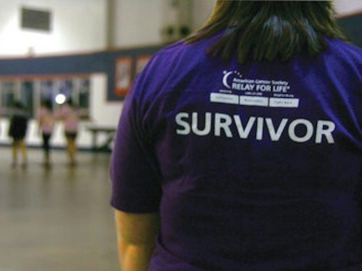 Collier's bright purple survivor shirt shows her victory over Hodgkin's lymphoma, a cancer that causes lymphatic cells to enlarge. (Rebekah weaver / Assistant photo editor)