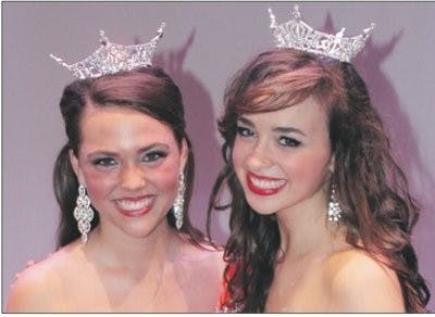 Holland Brown, left, and Emily Jordan stand together after Brown was named miss auburn Saturday, Jan. 26. Jordan was named miss au-
burn in 2012. (Emma Goddard / PHOTOGRAPHER)