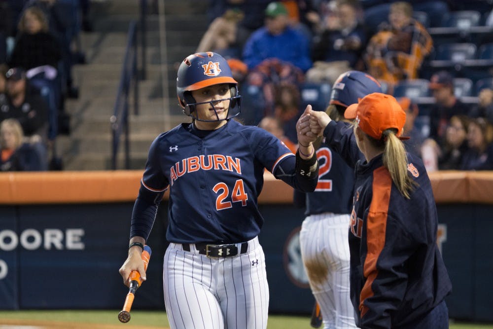 Auburn Tiger Kendall Veach (24) celebrates a run&nbsp;vs. Kennesaw State University on April 4, 2018, in Auburn, Ala.