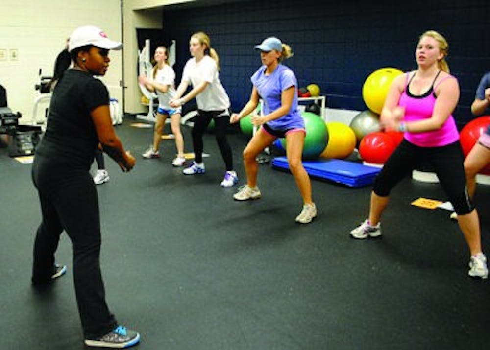 Circuit with a Twist instructor Ahaja Scott leads the group in cardio-dance exercises in between each station. (Maria Iampietro / Associate Photo Editor)