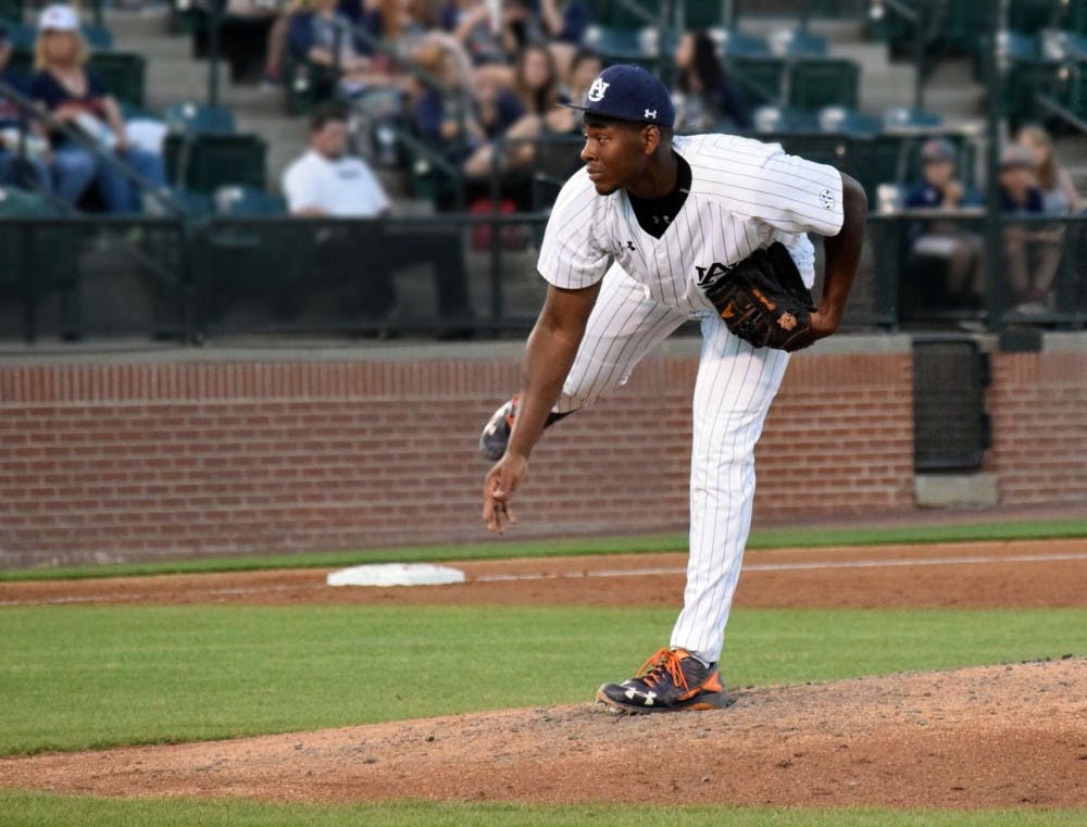 Daniel Sprinkle (28) throws a pitch against South Alabama on Tuesday, April 26, at Plainsman Park in Auburn, Ala.&nbsp;