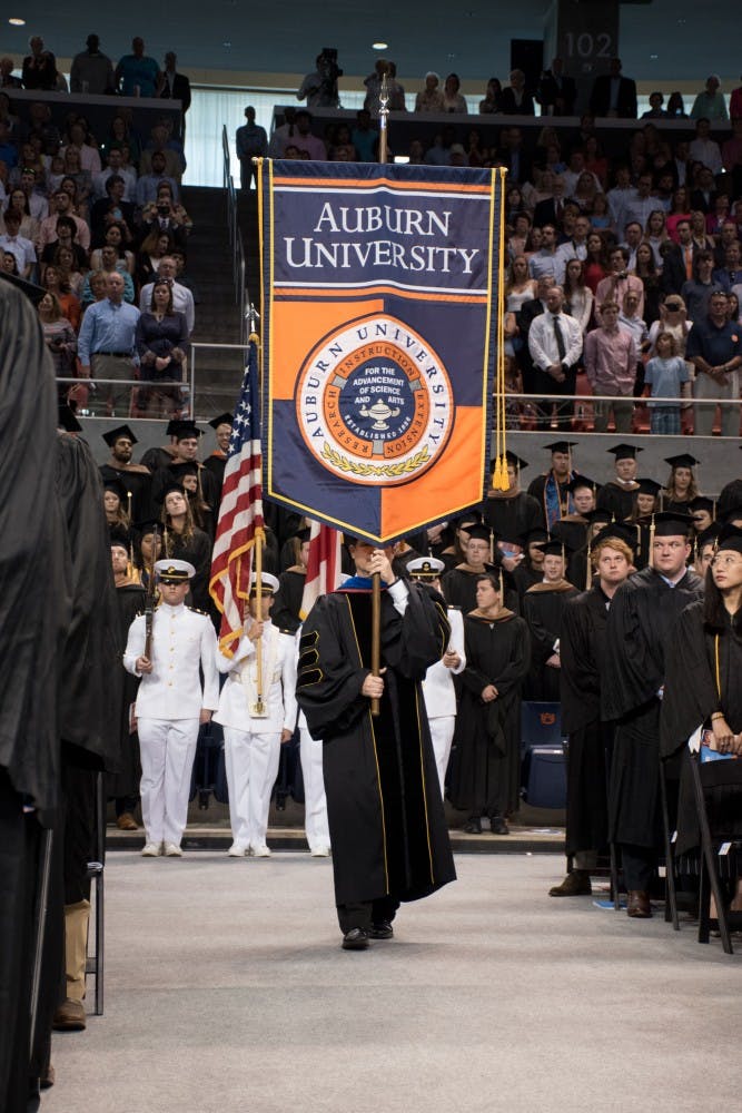 The processional begins at the graduation ceremony on Sunday, May 6, 2018, in Auburn, Ala.