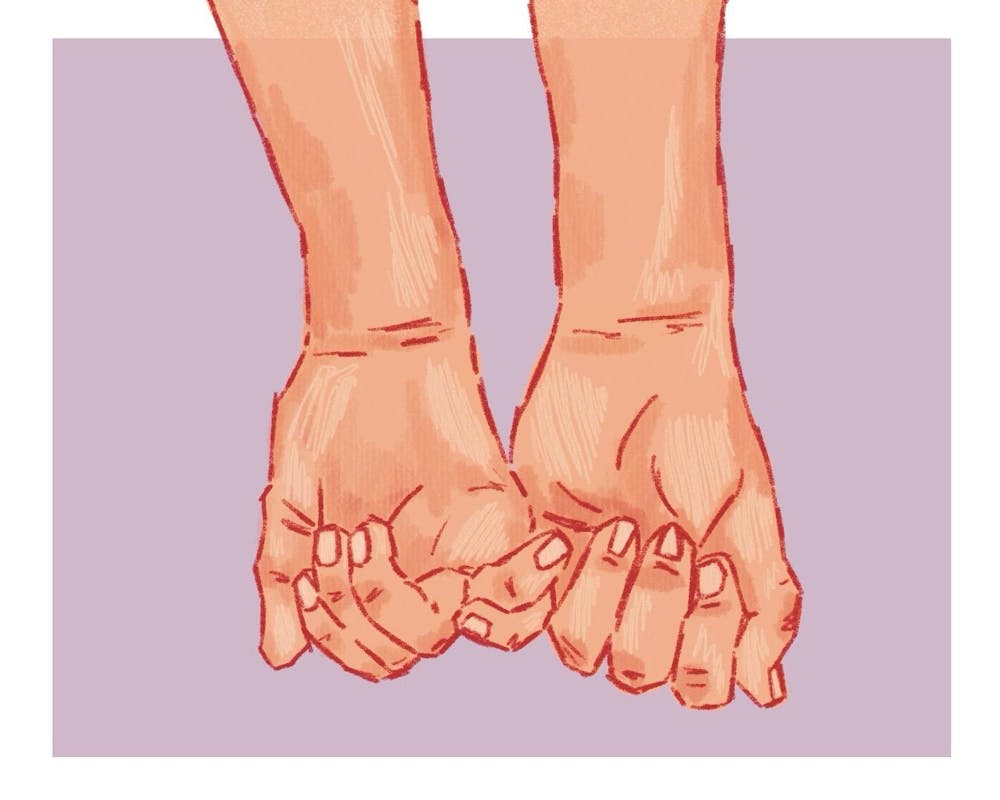 <p>Two hands are clasped together firmly, with fingers intertwined, set against a soft purple background.</p>