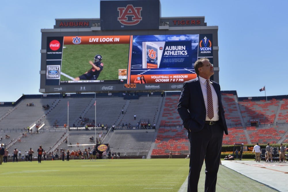 Gus Malzahn walks the field prior to a NCAA college football game, Saturday, Oct. 1, 2016, in Auburn, Ala.