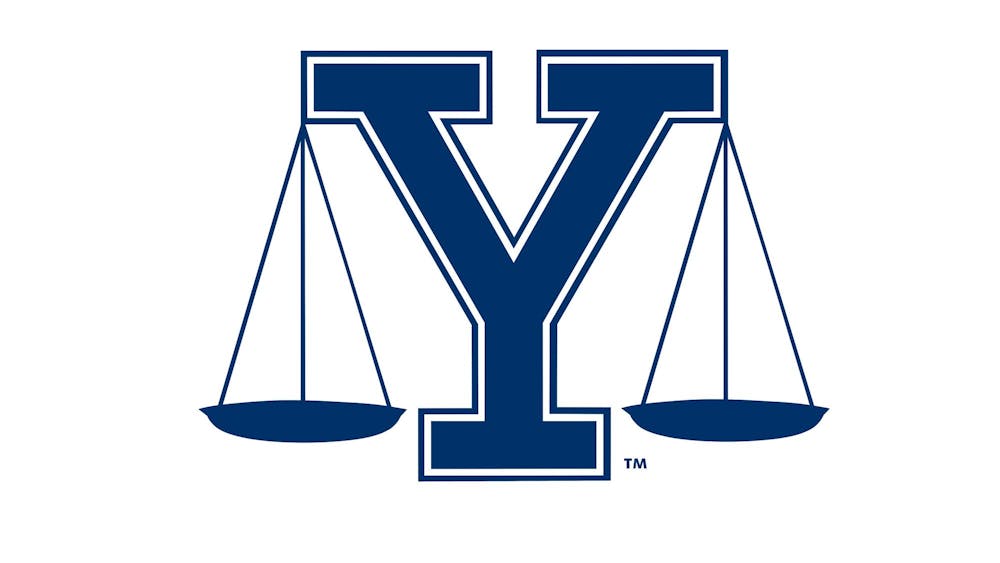 Yale logo with scales of justice.