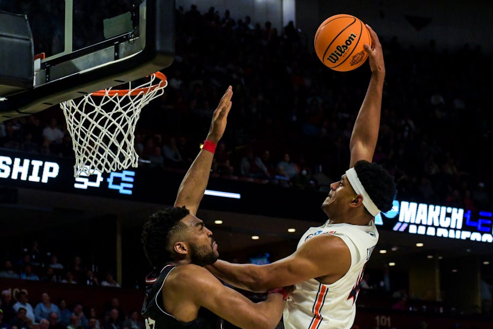 Dylan Cardwell (44) attempts to posterize a Gamecock defender in the Tigers' first-round win over Jacksonville State in the NCAA Tournament on March 18, 2022.
