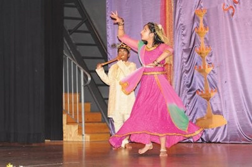 Swati Baskiyar and Teja Ramapuram perform in an act called Kathak Dance: Mohe Panghatpe, Saturday. (Christen Harned / ASSISTANT PHOTO EDITOR)