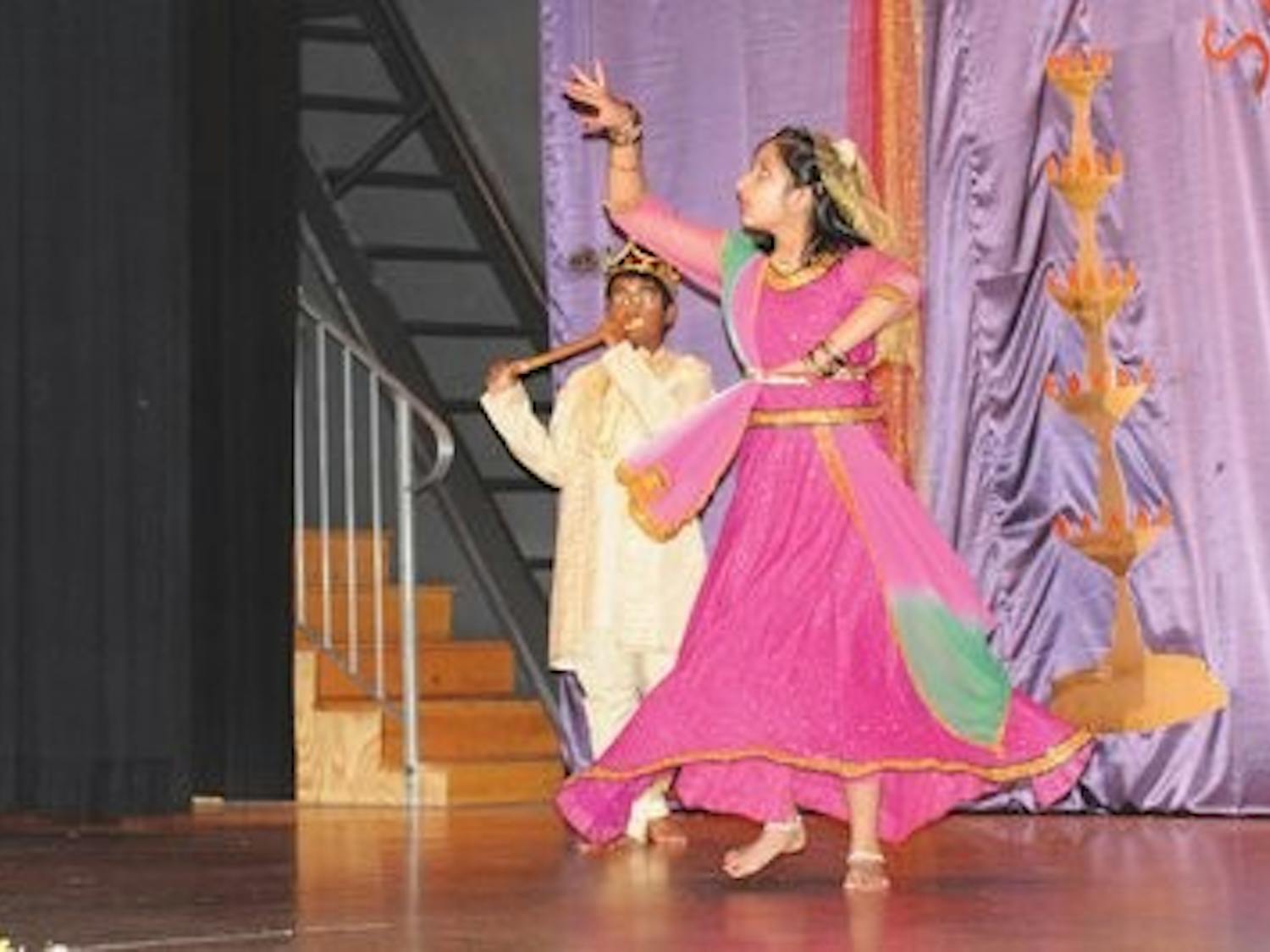 Swati Baskiyar and Teja Ramapuram perform in an act called Kathak Dance: Mohe Panghatpe, Saturday. (Christen Harned / ASSISTANT PHOTO EDITOR)