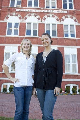 Erica Meissner and Krissy Voss stand in front of Samford Hall. Both are finalists for a Rhodes Scholarship. (Emily Adams / Photo Editor)