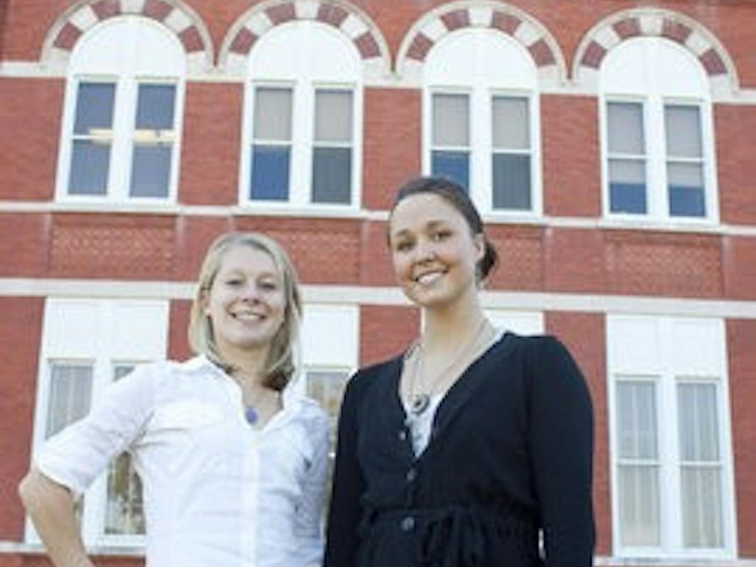 Erica Meissner and Krissy Voss stand in front of Samford Hall. Both are finalists for a Rhodes Scholarship. (Emily Adams / Photo Editor)