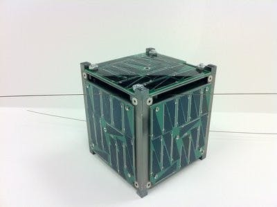 Not all satellites are huge. The AubieSat-1 is small enough to sit on a desk. (CONTRIBUTED)