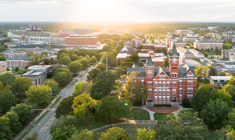 <p>Auburn's Samford Hall sits with the sun setting behind it on Oct. 7, 2025</p>
