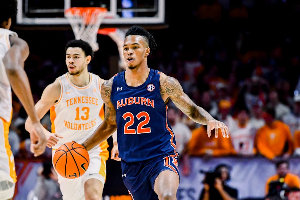 Auburn guard Allen Flanigan takes the ball down the court against Tennessee, on February 4, 2023, in Knoxville, TN. 