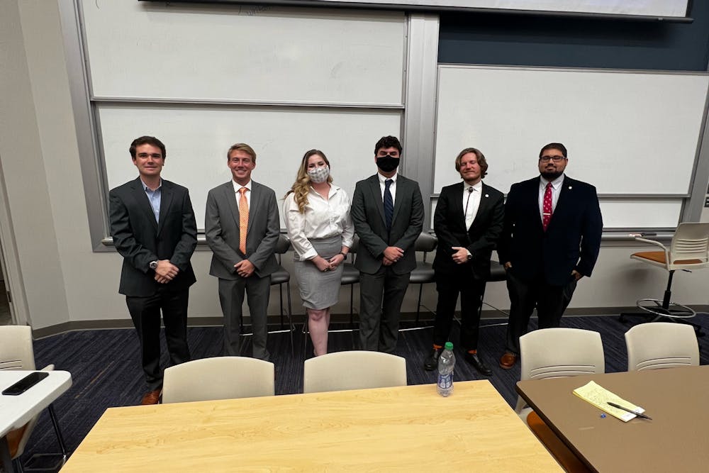 <p>From left to right, Jack Disharoon and Jonathan Stuckey from College Republicans; Joelle Woggerman and Seth Johnson from College Democrats; and Gaines Odom and Keller Williams from Plainsmen for Liberty. These groups discussed six political topics during the Great Debate on Oct. 12, 2021.</p>