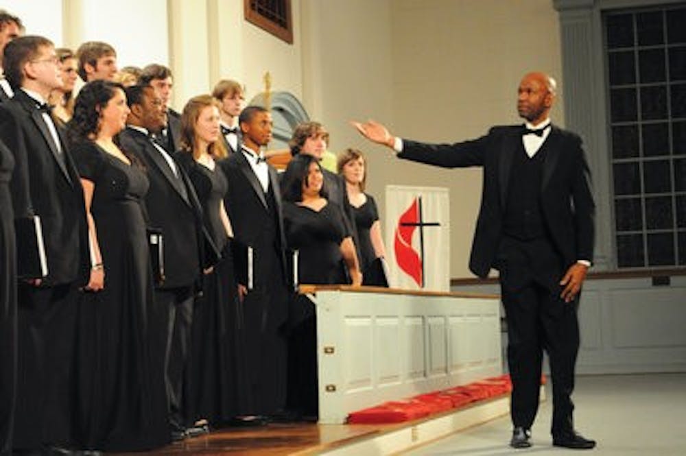 William Powell introduces the Auburn University Chamber Choir at Saturday's concert. (Christen Harned / Assistant Photo Editor)