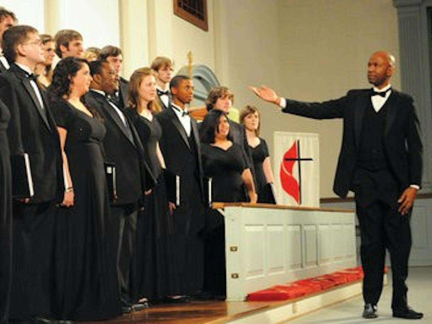 William Powell introduces the Auburn University Chamber Choir at Saturday's concert. (Christen Harned / Assistant Photo Editor)