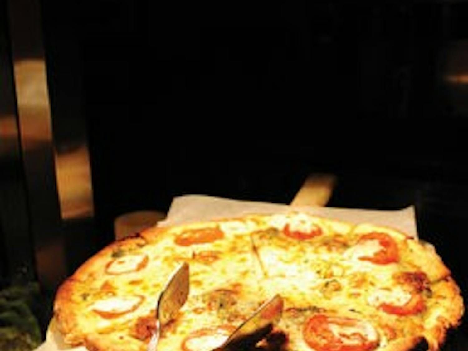 Ariccia's buffet Thursday evening at the Auburn Hotel and Conference Center features pizza and many other options for customers. (Maria Iampietro / Associate Photo Editor)