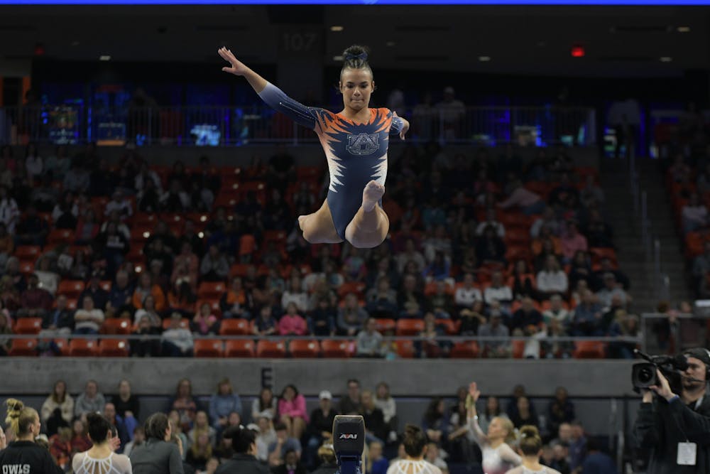 <p>Freshman Paige Zancan ties her career best with a 9.825 on beam during Auburn's quad meet on Feb. 2, 2024.</p>