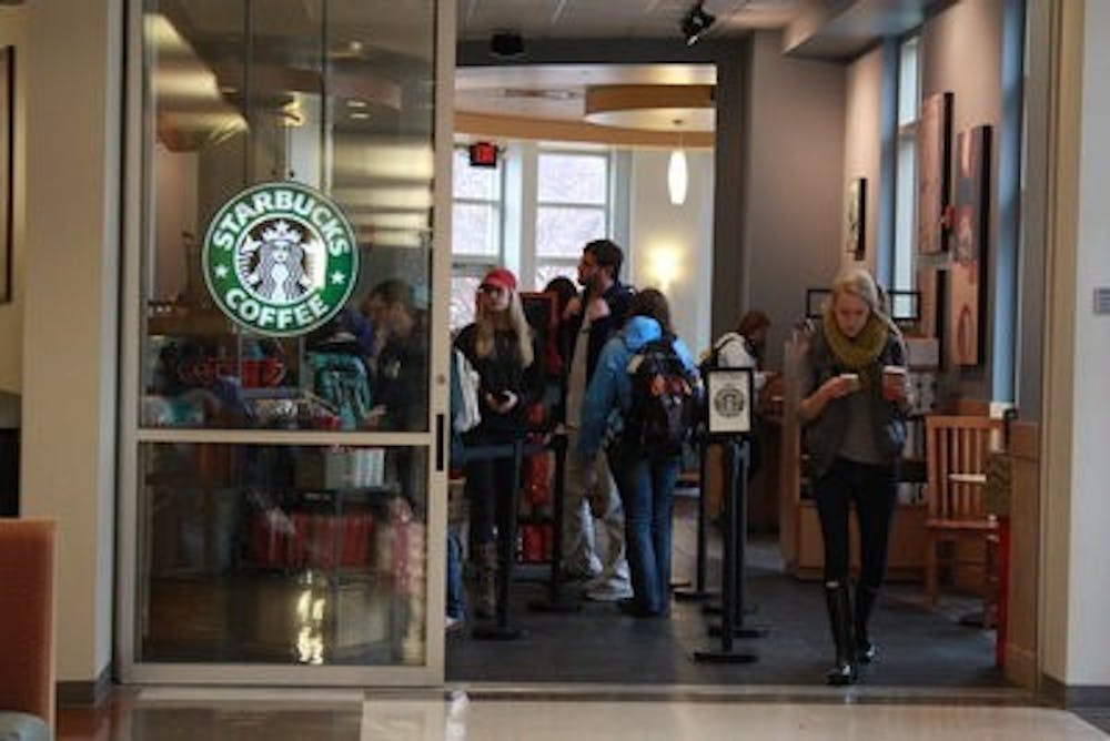 Student in line at the Auburn Student Center Starbucks.