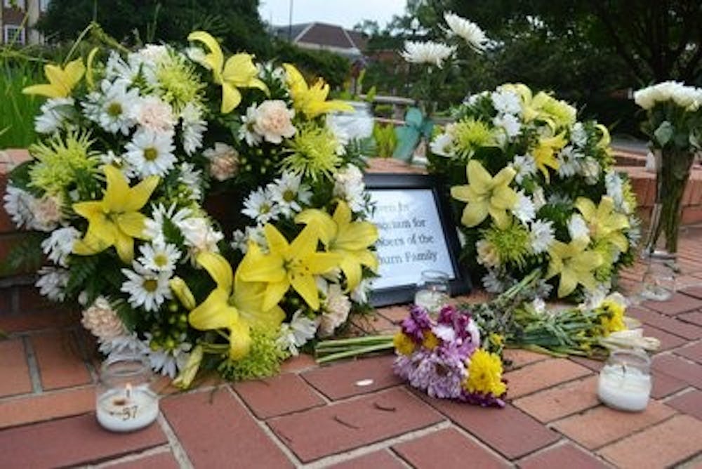 The memorial is set up at Ross Square. A candle light vigil is scheduled for Thursday at 8 p.m. on Samford lawn. (Danielle Lowe / PHOTO EDITOR)