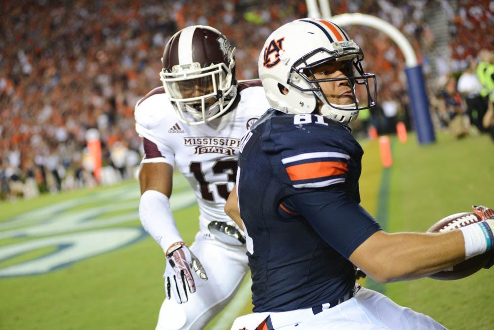C.J. Uzomah at the end of Auburn's final push, after his game-winning touchdown.  (Daniel Oramas / MULTIMEDIA EDITOR)