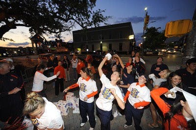 The women's golf team rolls Toomer's Corner after winning the SEC Championship Sunday. (Courtesy of TODD VAN EMST)