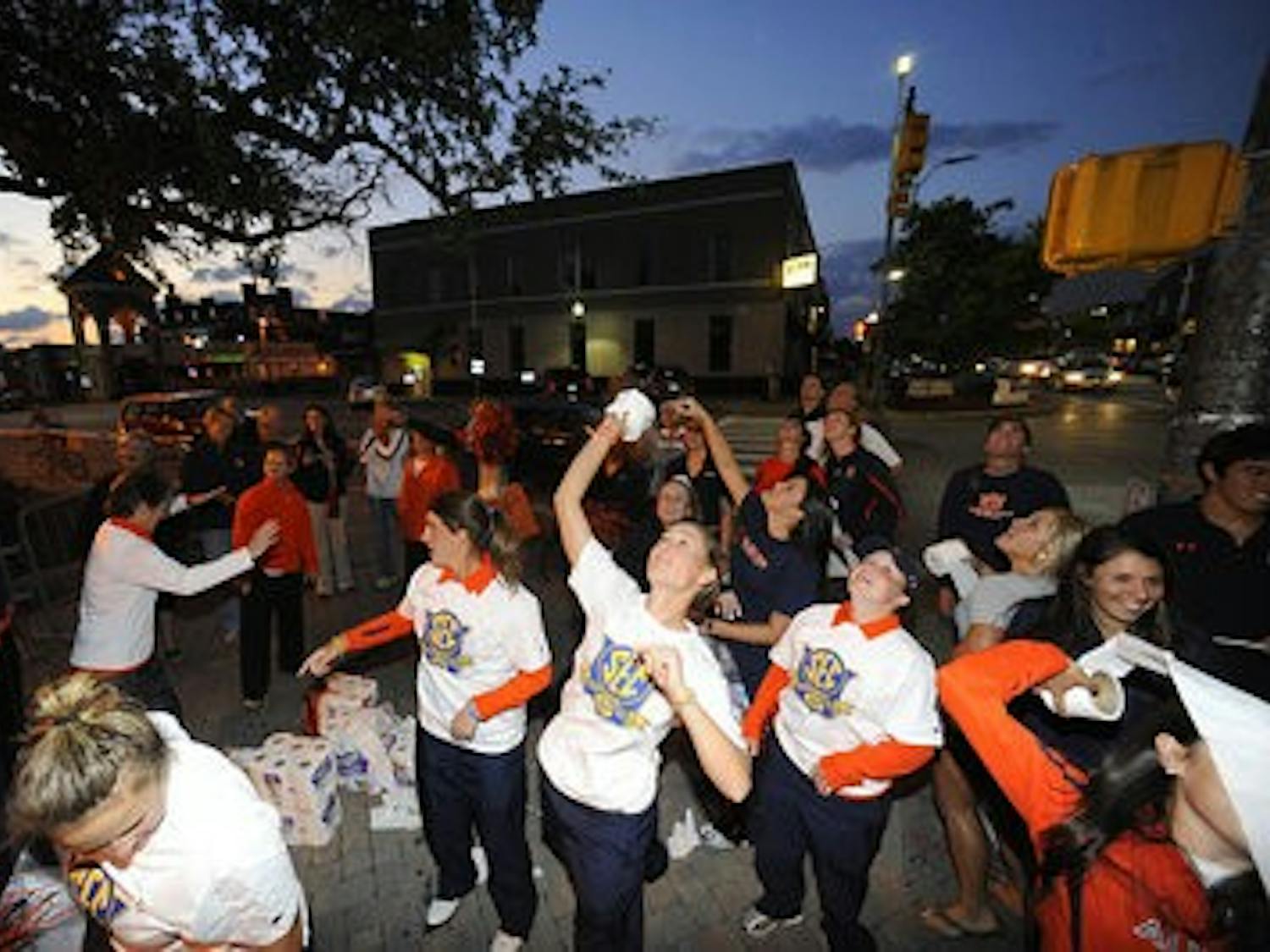 The women's golf team rolls Toomer's Corner after winning the SEC Championship Sunday. (Courtesy of TODD VAN EMST)