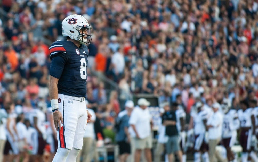 <p>Jarrett Stidham (8) looks to the sideline for the next play in the first half. Auburn vs Mississippi State on Saturday, Sept. 30 in Auburn, Ala.</p>