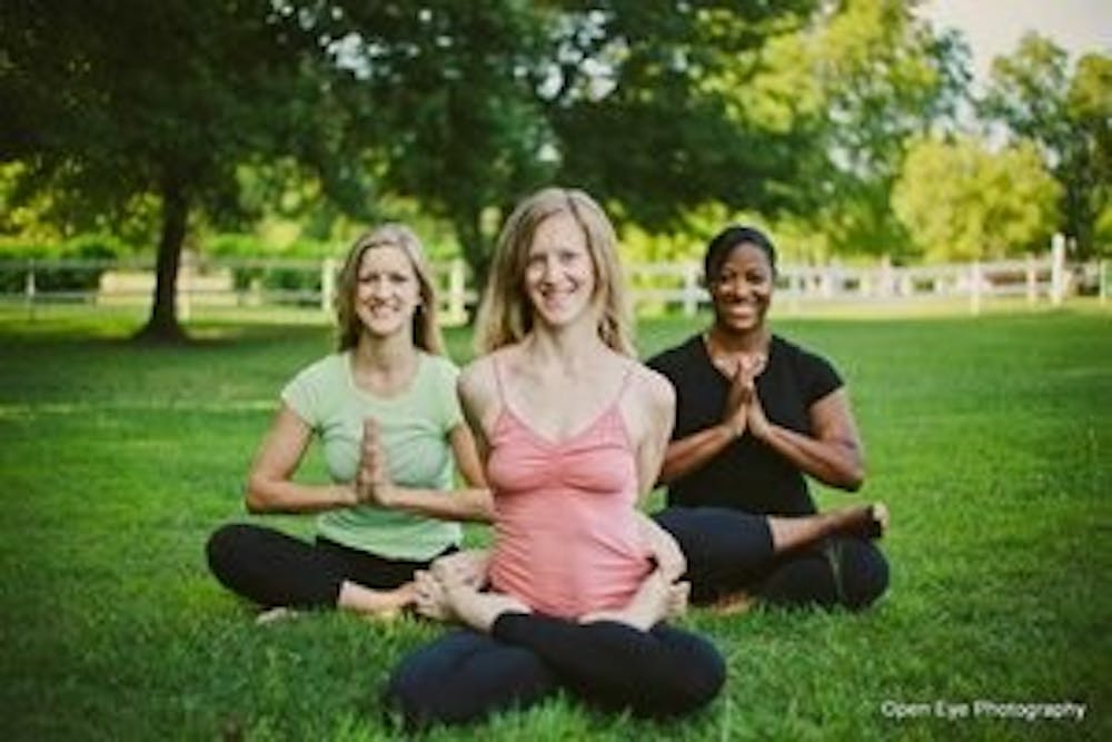 From left to right: Yogafly instructors Kate Kirby, Peach Dumars and Jessica Carry. (Contributed)