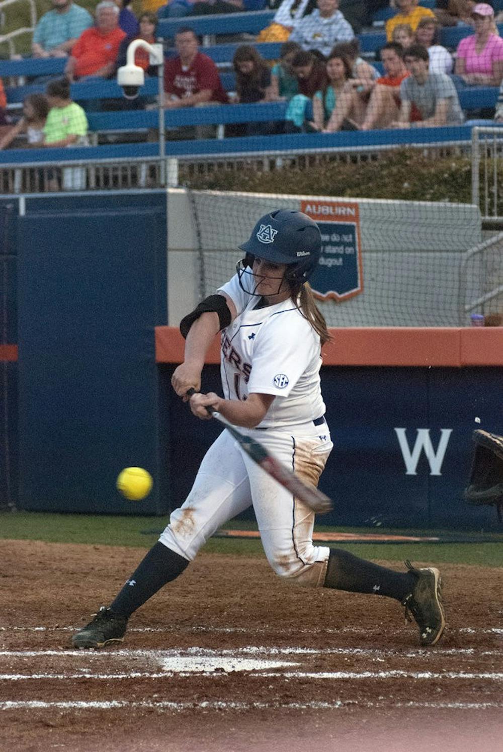 Kasey Cooper (#13) hits. (Emily Enfinger | Assistant Photo Editor)