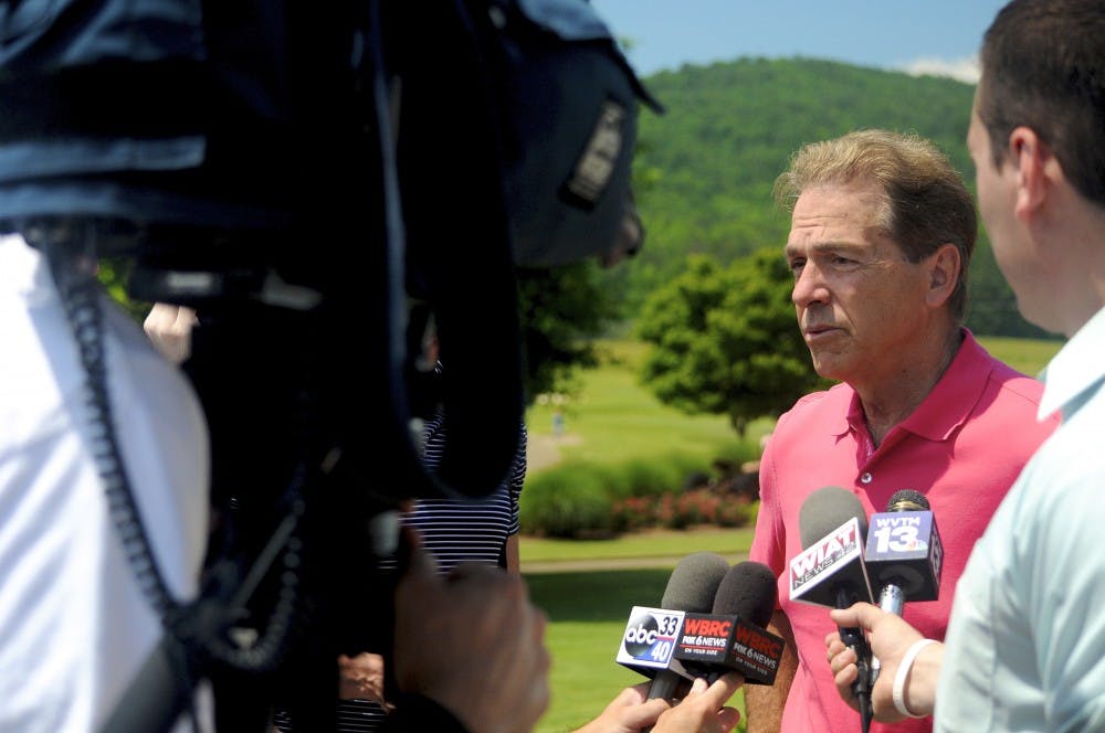 <p>Nick Saban, head football coach at the University of Alabama, is interviewed at Lutzie 43 Invitational Golf Tournament in Sylacauga, Ala. on Tuesday, May 24, 2016.</p>