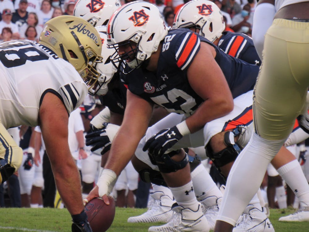 <p>Nick Brahms lines up to snap the ball during a game against Akron on Sept. 4, 2021, at Jordan-Hare Stadium in Auburn, Alabama.</p>