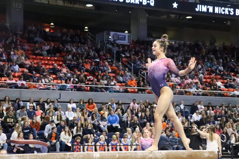 <p>Cassie Stevens on beam during Auburn University Gymnastics vs. Texas Women's University on Feb. 28, 2020, in Auburn, Ala.</p>